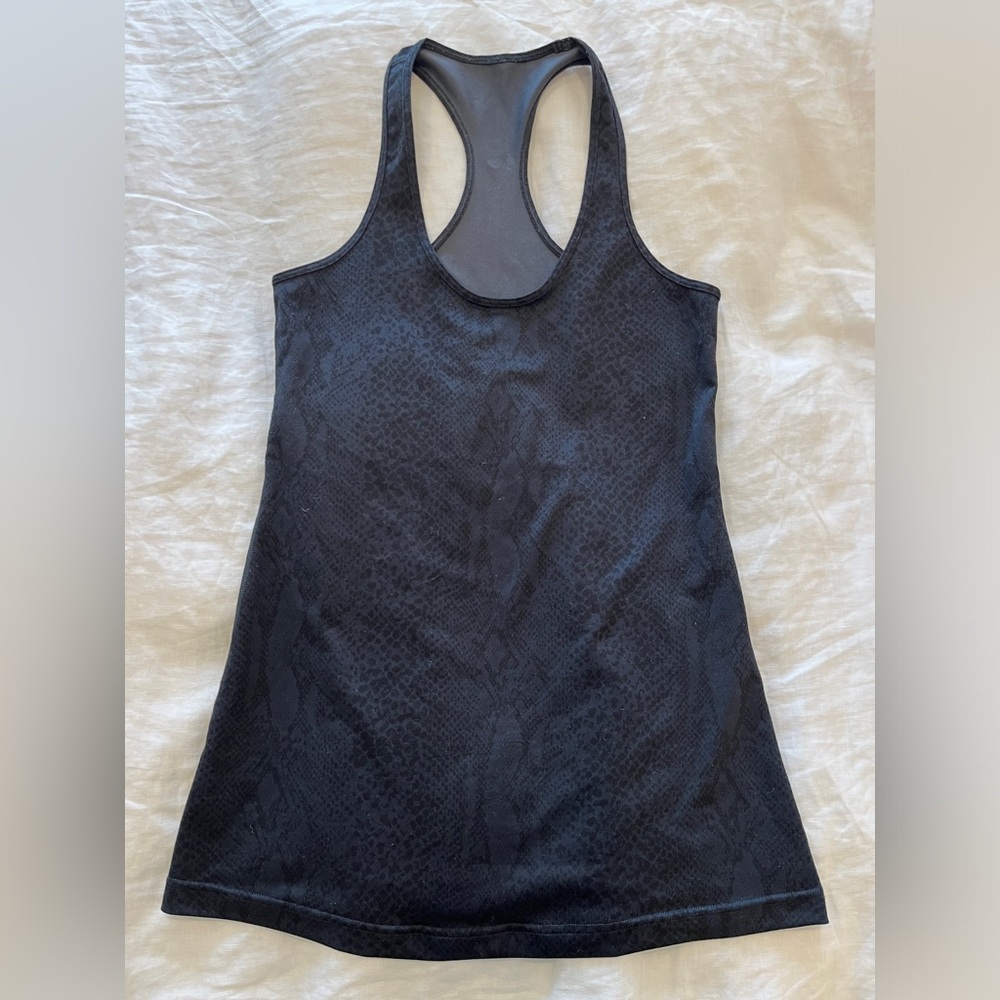 Excellent condition! Black Lululemon snakeskin print top, size 6
